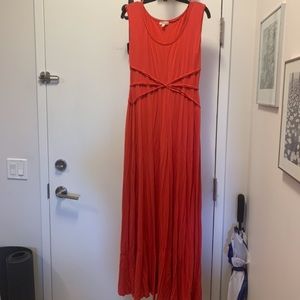Reddish/orange coloured maxi dress. Size large.